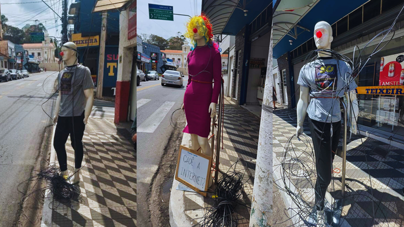 Comerciante faz protesto com manequim por problemas de fios soltos em Pouso Alegre